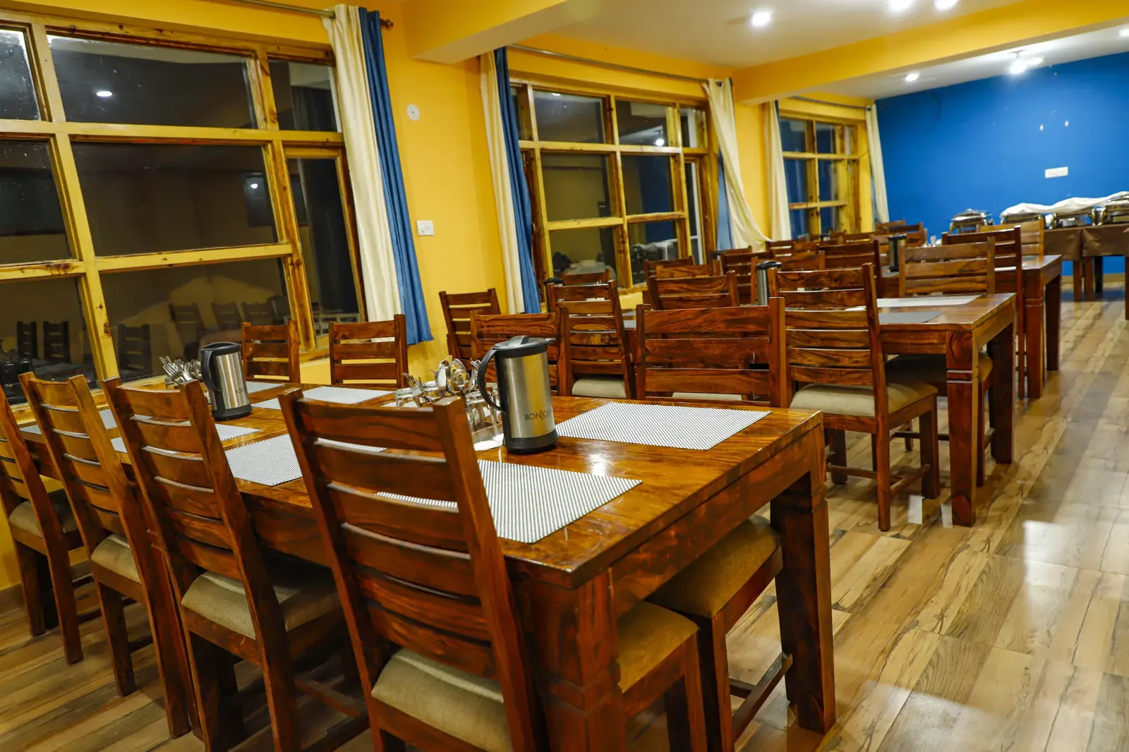 Dining hall with long wooden tables
