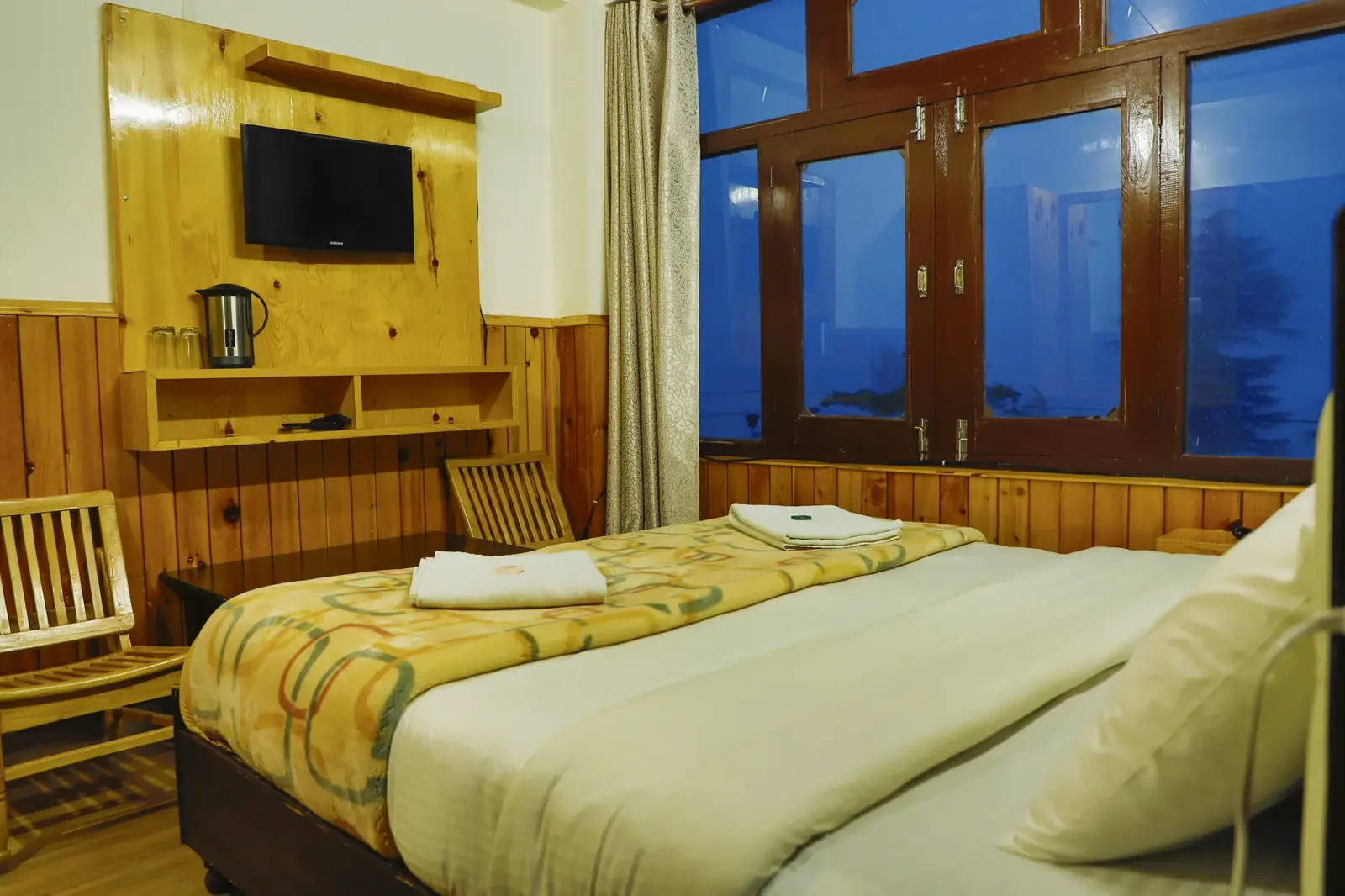Room with twin windows and a writing desk