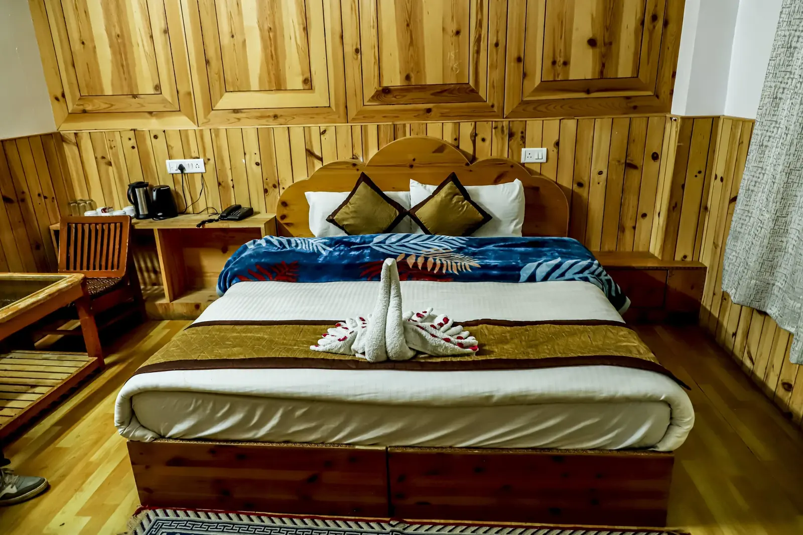 Super Deluxe room panelled in pine