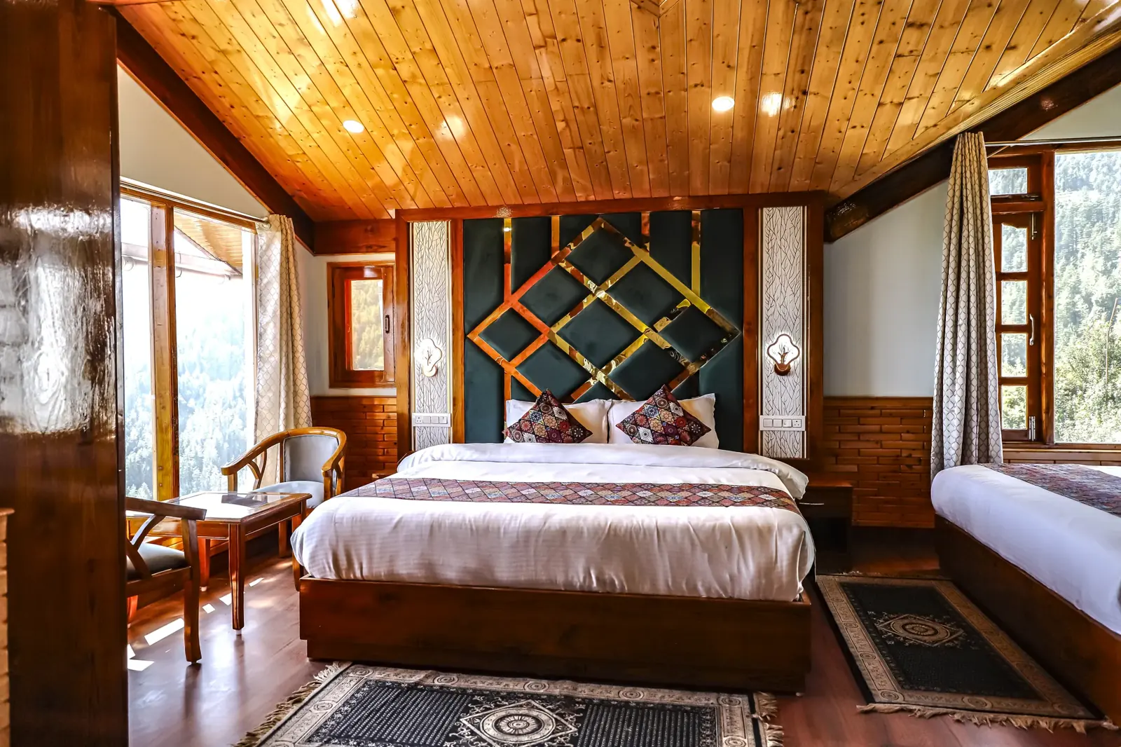 Premium room under a carved wooden ceiling