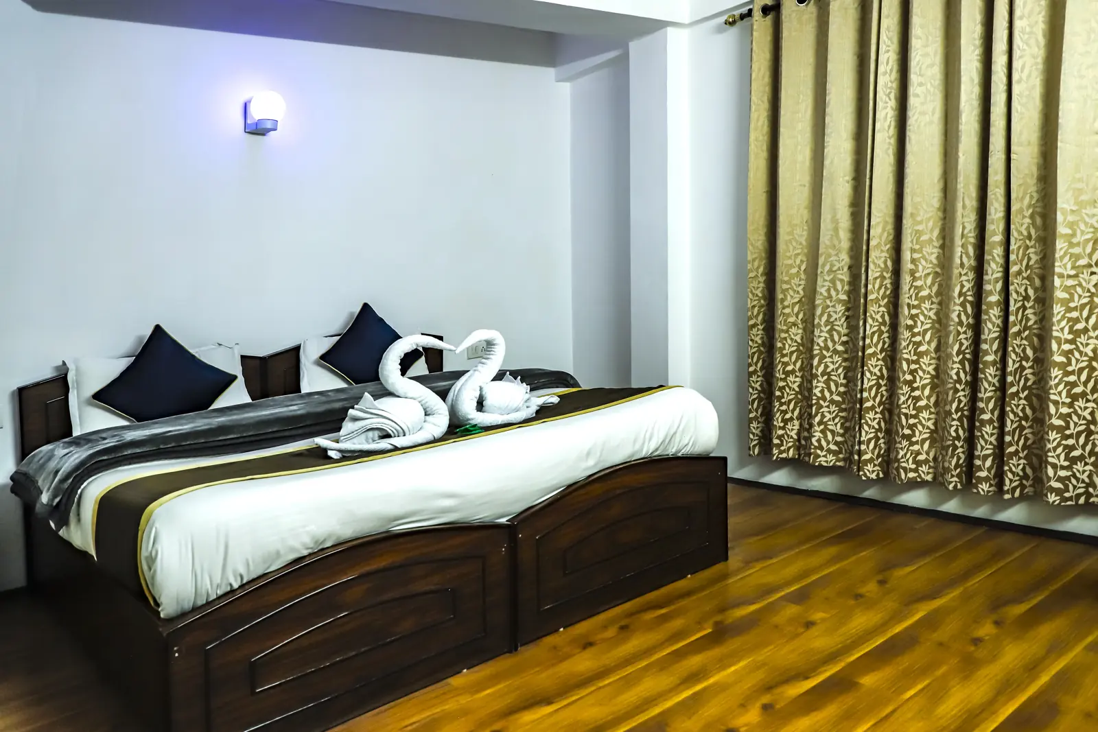 Twin room with wooden floors