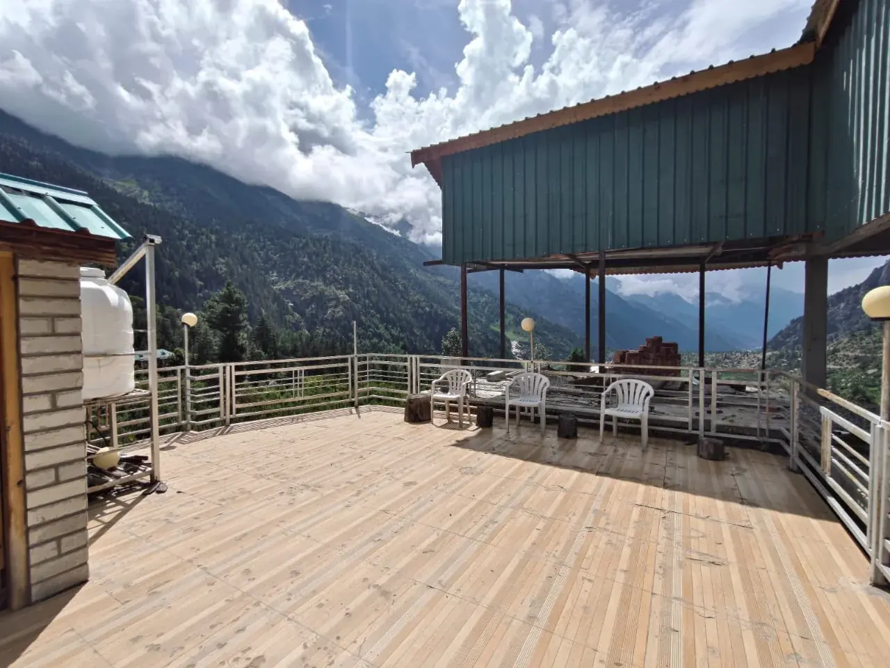 Open-air deck and sitting area at The Shambhu Lodge