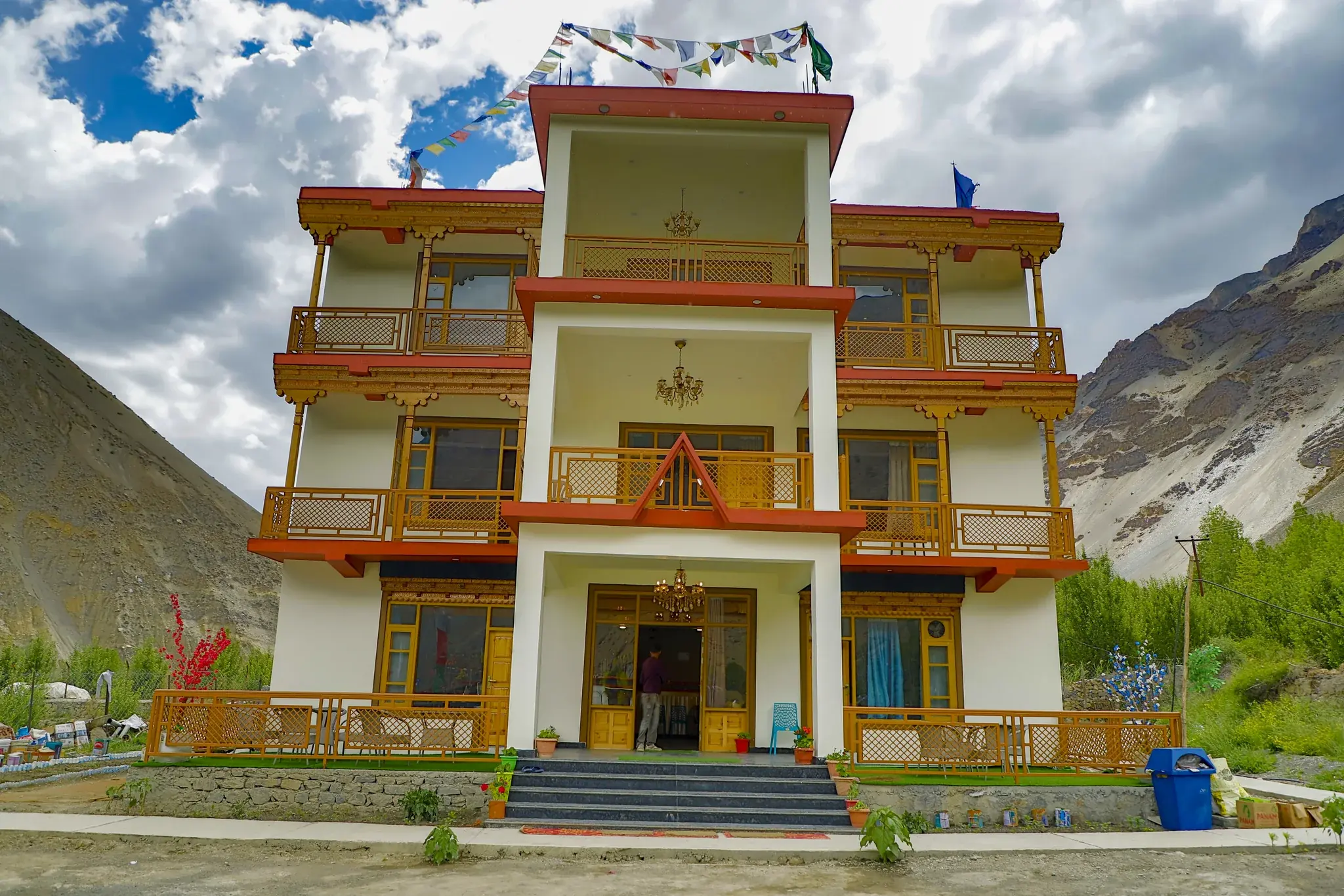 The Tiger Inn, a three-storey hotel with carved balconies in Tabo