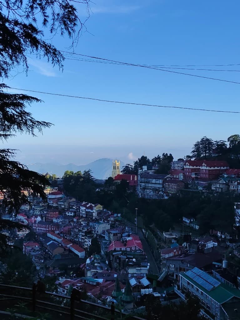 Shimla's hillside at dusk, where our team is based